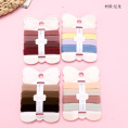 Small product photo - Boxed 4-Pack Thick Terry Hair Rings. Option #1